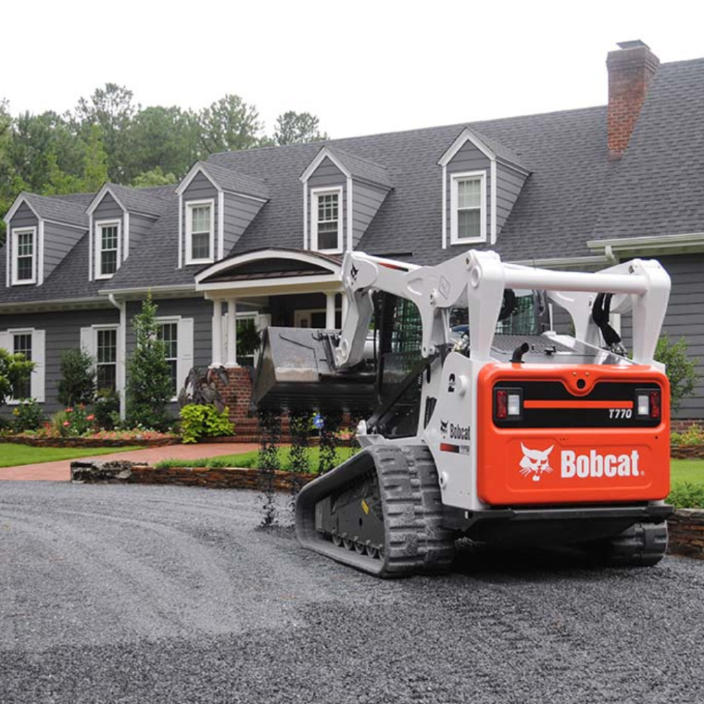 John Wayne Clearing & Grading installing a gravel driveway