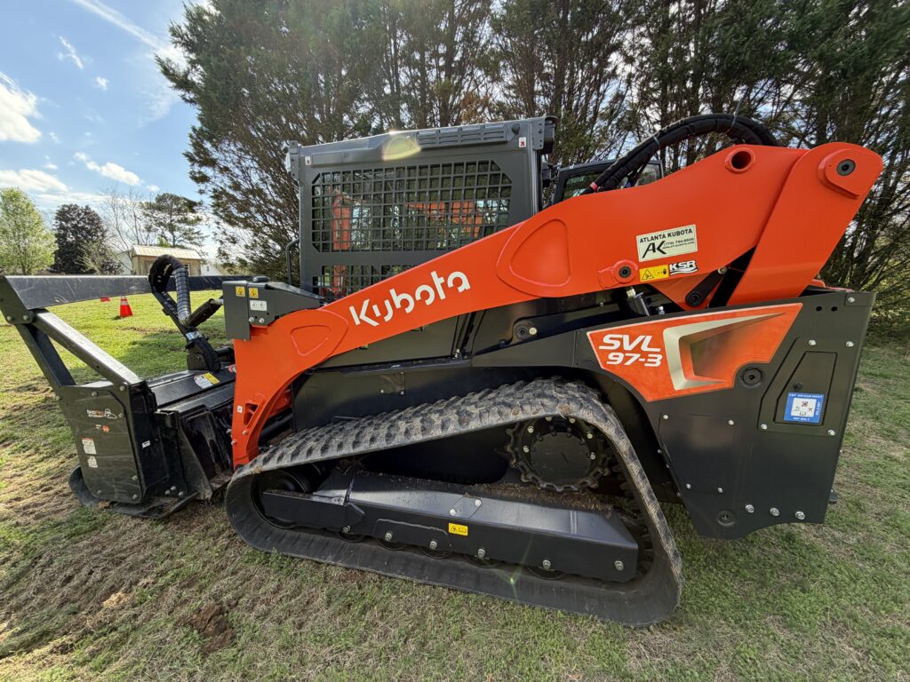 Kubota SVL97-3 compact track loader used for forestry mulching, land clearing, excavation, and grading in Metro Atlanta, Georgia.